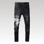 AMIRI jeans angel​ black with white angel print and distressed details on premium black denim